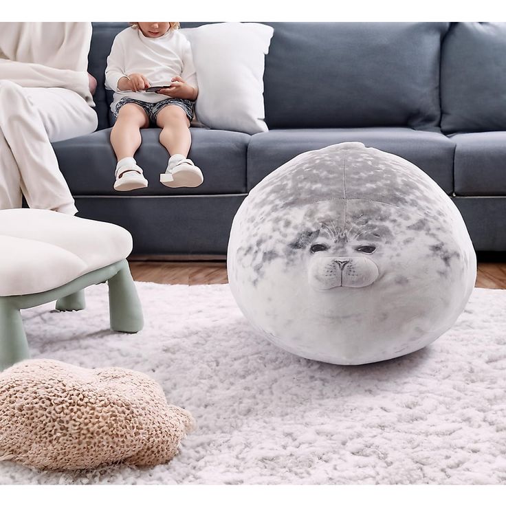 "Caution: Hug Magnet — The Seal Pillow"