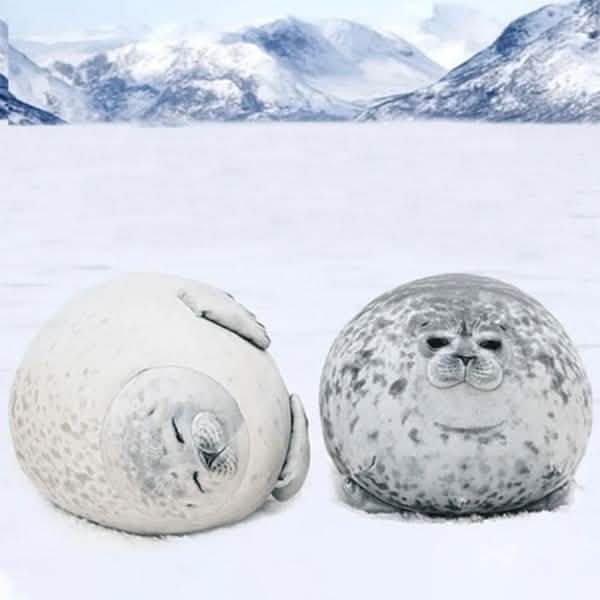 "Caution: Hug Magnet — The Seal Pillow"