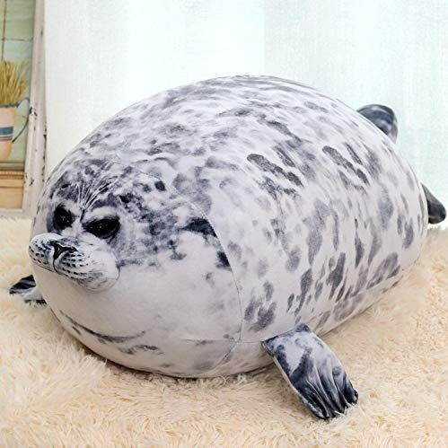 "Caution: Hug Magnet — The Seal Pillow"
